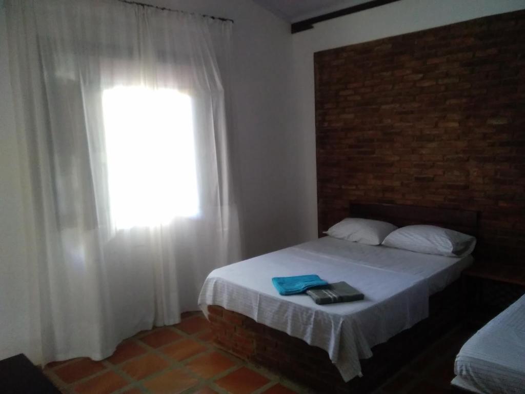 Кровать или кровати в номере B&B Residencia Casa Branca