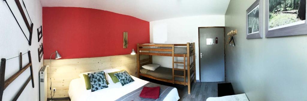 Postel nebo postele na pokoji v ubytování AUBERGE GAILLARD