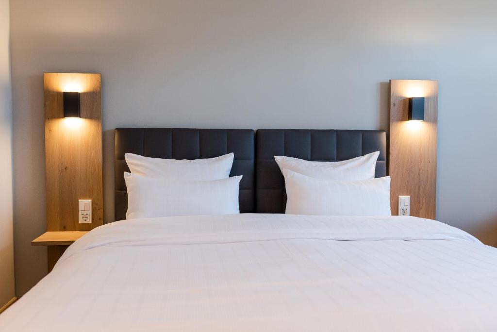 Postel nebo postele na pokoji v ubytování Hotel Circle Inn