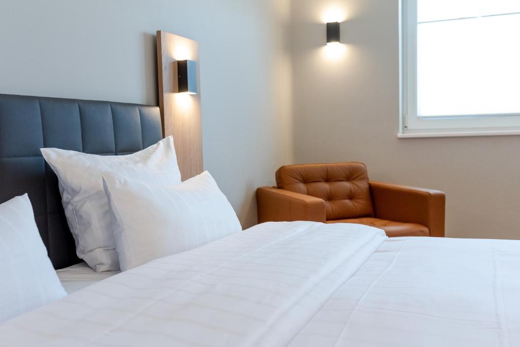 Postel nebo postele na pokoji v ubytování Hotel Circle Inn
