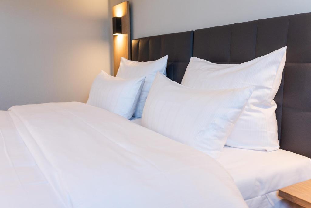 Postel nebo postele na pokoji v ubytování Hotel Circle Inn