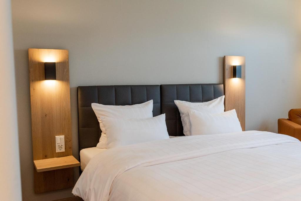 Postel nebo postele na pokoji v ubytování Hotel Circle Inn