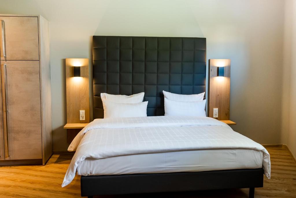 Postel nebo postele na pokoji v ubytování Hotel Circle Inn