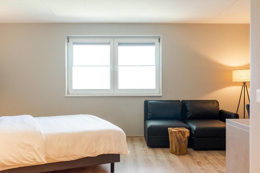 Postel nebo postele na pokoji v ubytování Hotel Circle Inn
