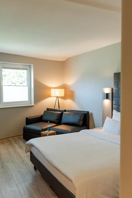 Postel nebo postele na pokoji v ubytování Hotel Circle Inn