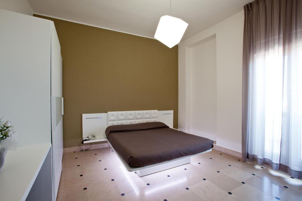 Postel nebo postele na pokoji v ubytování Hyencos Hotel Calos