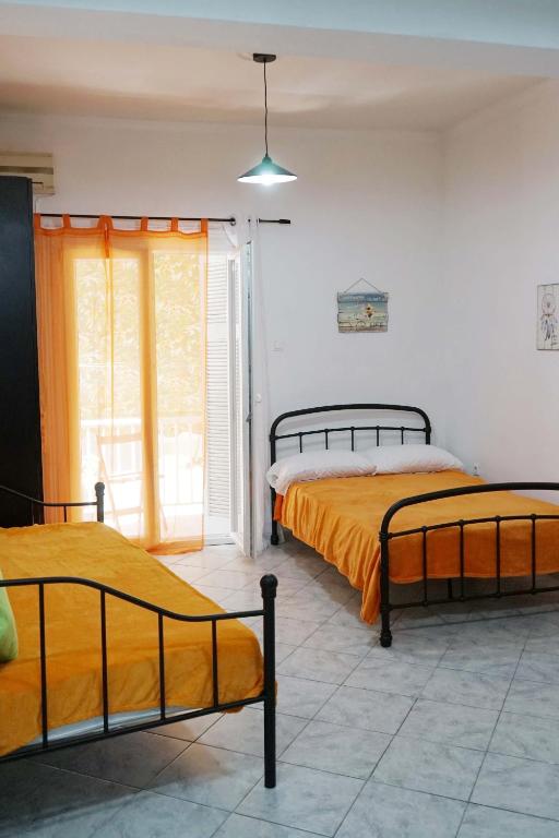 Posteľ alebo postele v izbe v ubytovaní Dream Acropolis Flat