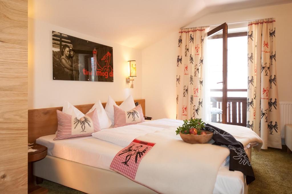 Ein Bett oder Betten in einem Zimmer der Unterkunft Lieblingsplatz Tirolerhof