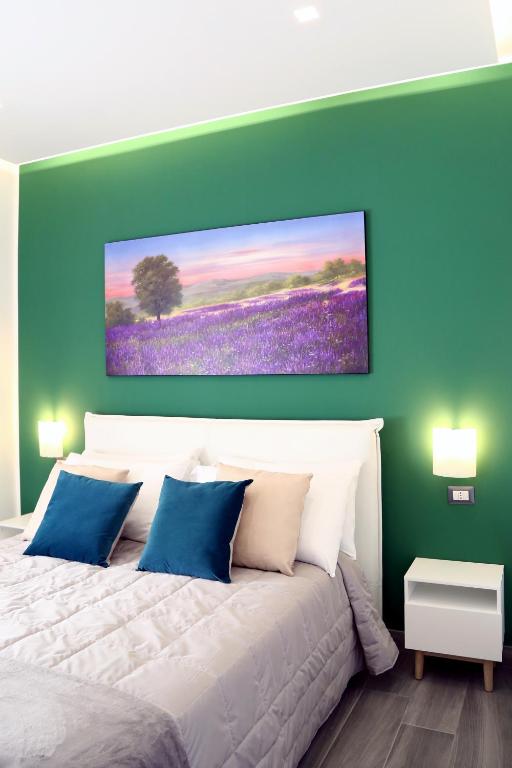 Posteľ alebo postele v izbe v ubytovaní B&B Maremy... I 4 Elementi