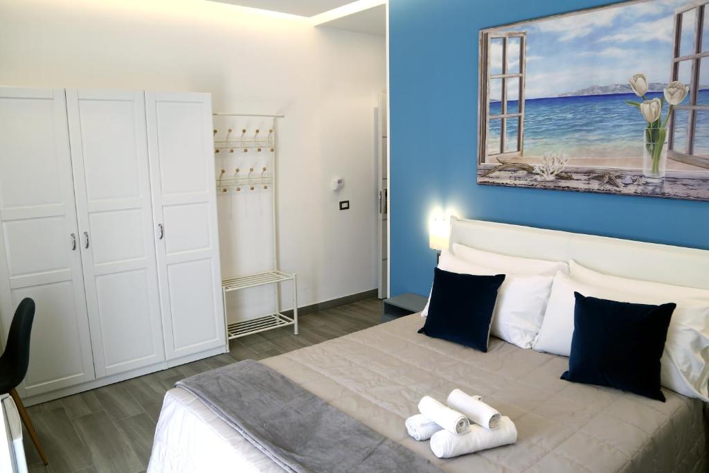 Posteľ alebo postele v izbe v ubytovaní B&B Maremy... I 4 Elementi