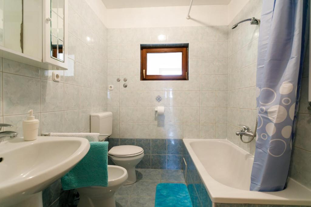 Kúpeľňa v ubytovaní Apartman Sintić