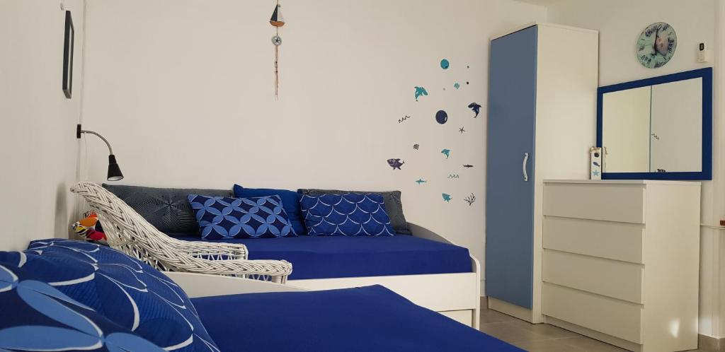 Posteľ alebo postele v izbe v ubytovaní Apartmani Balažić