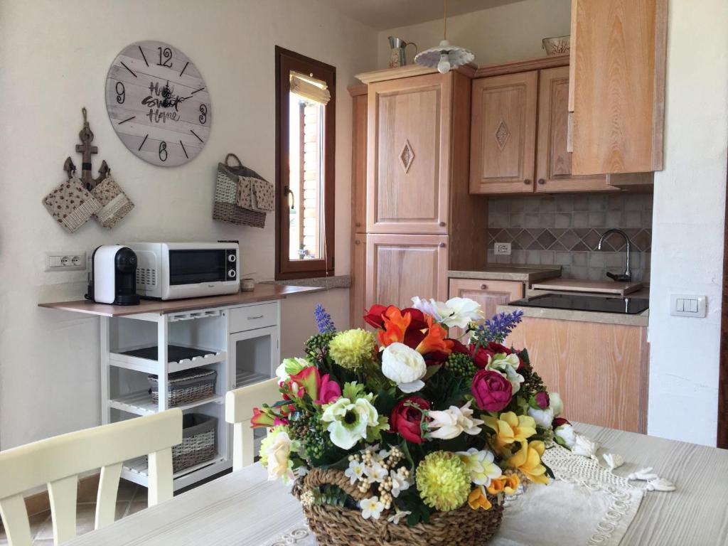A kitchen or kitchenette at Il Tramonto Tanca Piras