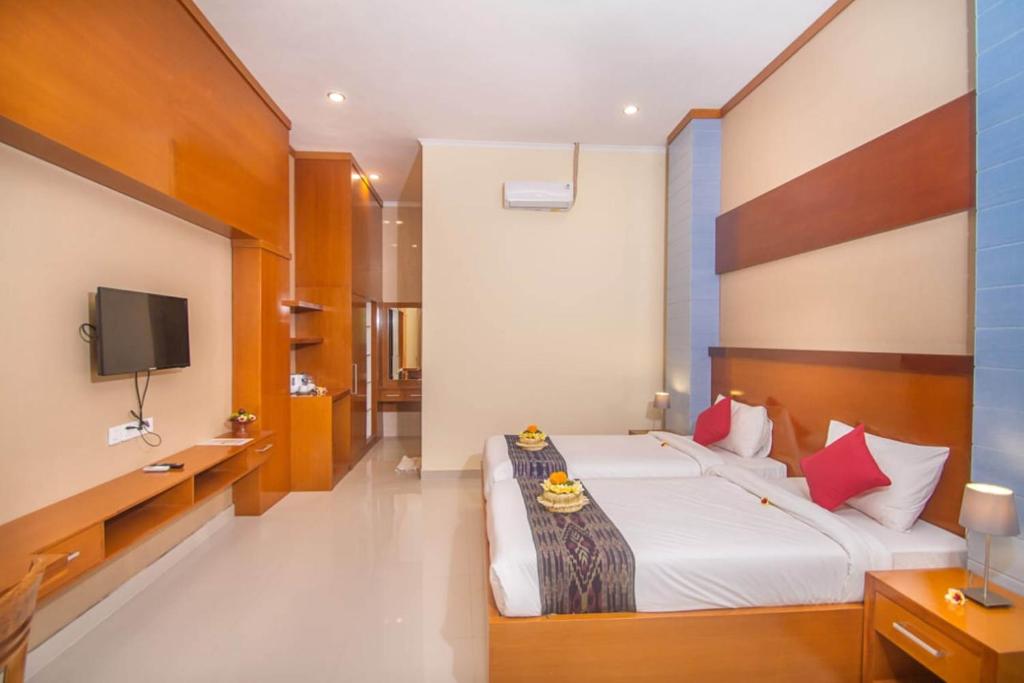 TV a/nebo společenská místnost v ubytování Adi Jaya Cottages Ubud Suites by EPS - CHSE Certified