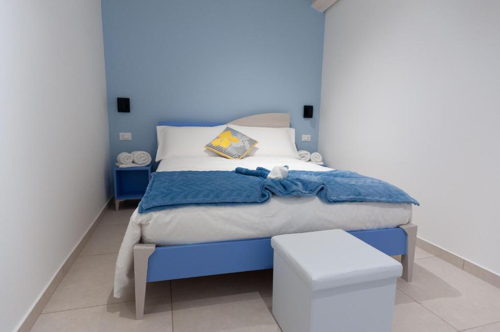 A bed or beds in a room at Casamata