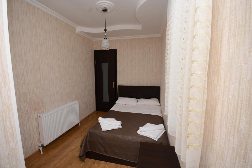 Postel nebo postele na pokoji v ubytování Olimpo Guest House