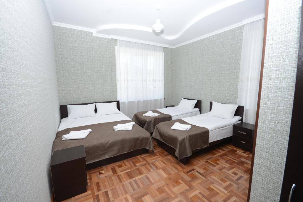 Postel nebo postele na pokoji v ubytování Olimpo Guest House