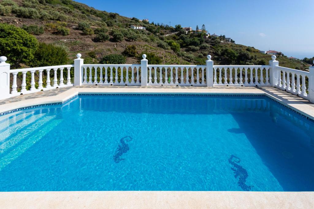 The swimming pool at or close to Cortijo Torrox Escape