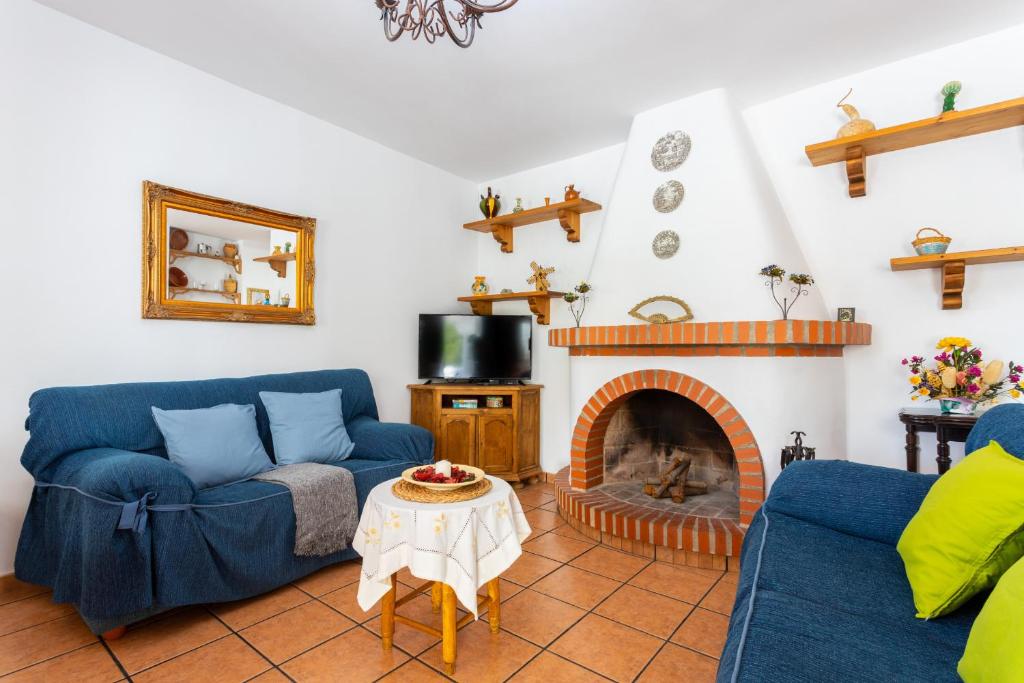 A seating area at Cortijo Torrox Escape