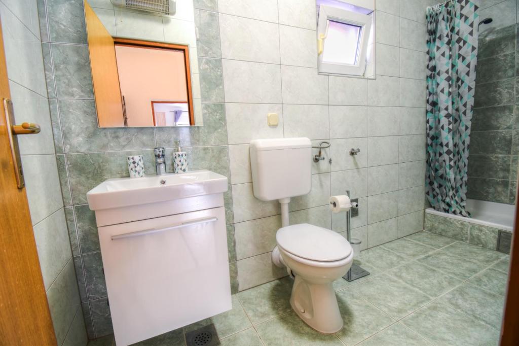 Kúpeľňa v ubytovaní Apartmani Matko