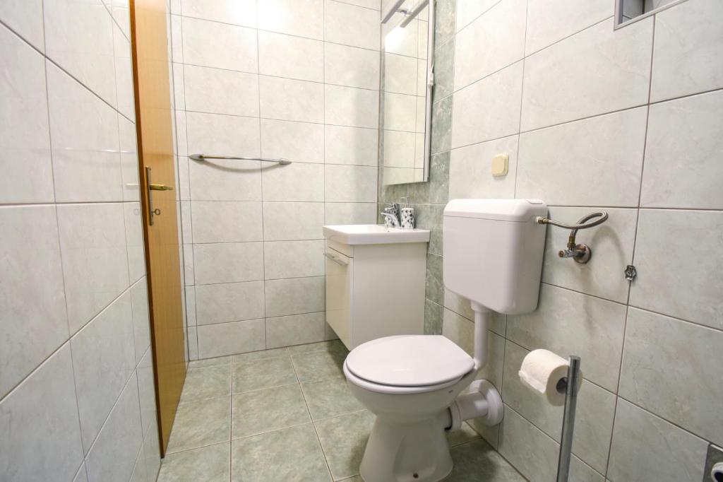Kúpeľňa v ubytovaní Apartmani Matko