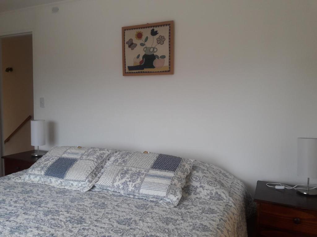 Postel nebo postele na pokoji v ubytování Cabanas Viento Sur. Los Vilos