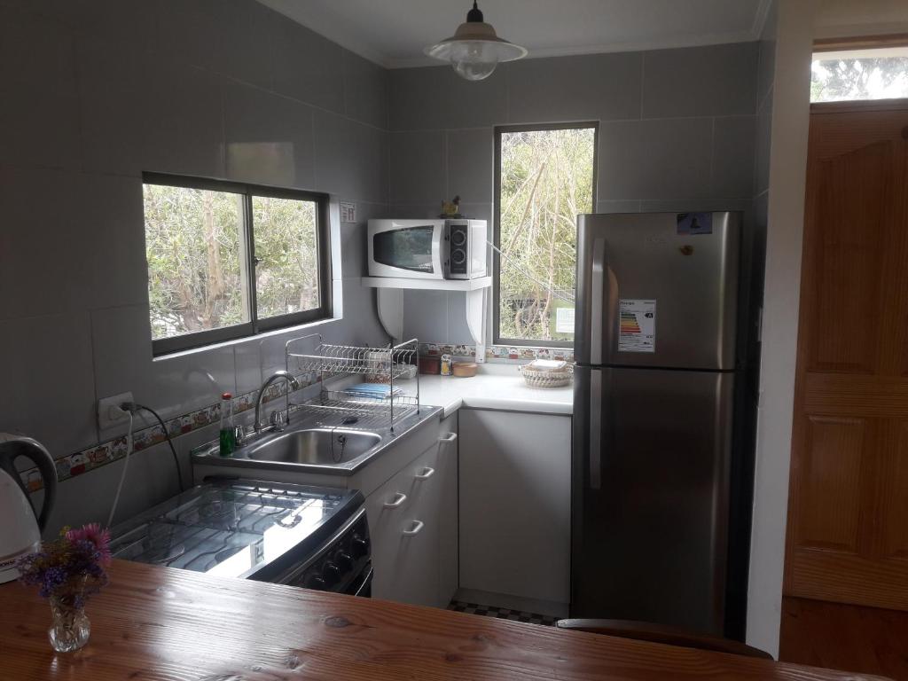 Kuchyň nebo kuchyňský kout v ubytování Cabanas Viento Sur. Los Vilos