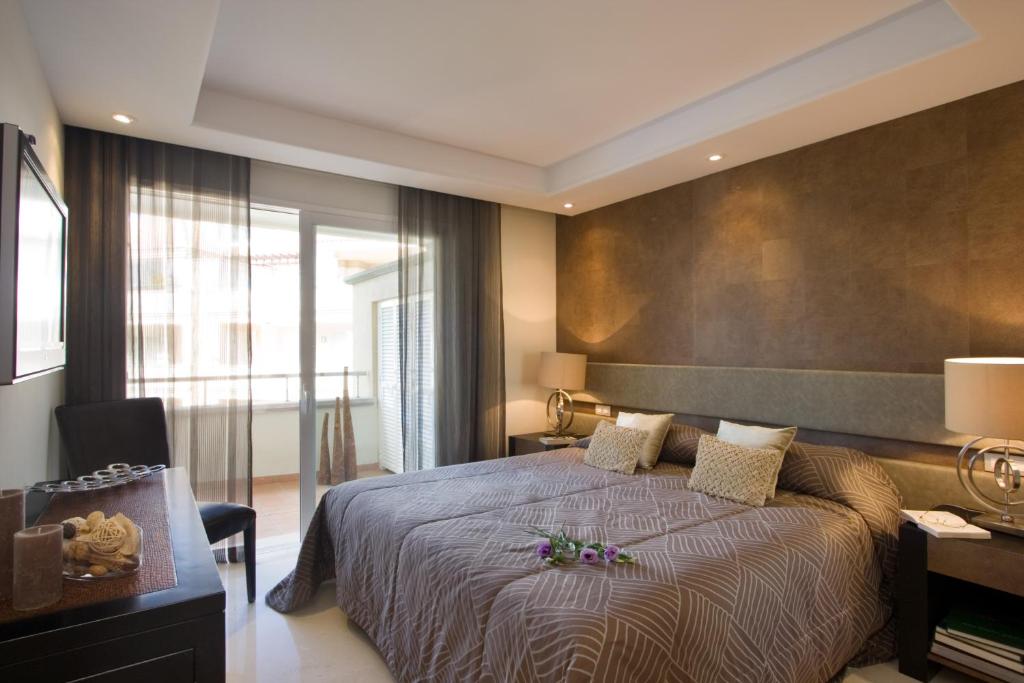 Кровать или кровати в номере Apartment 213 Guadalmansa Playa Heaven Beach Apartrments