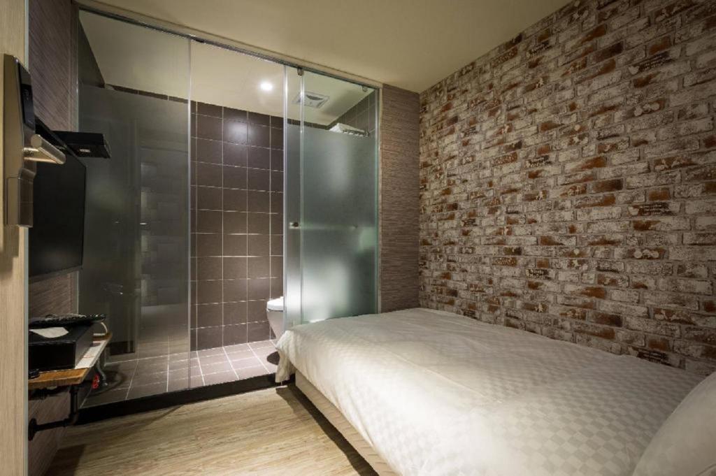 Postel nebo postele na pokoji v ubytování The Cole Hotel