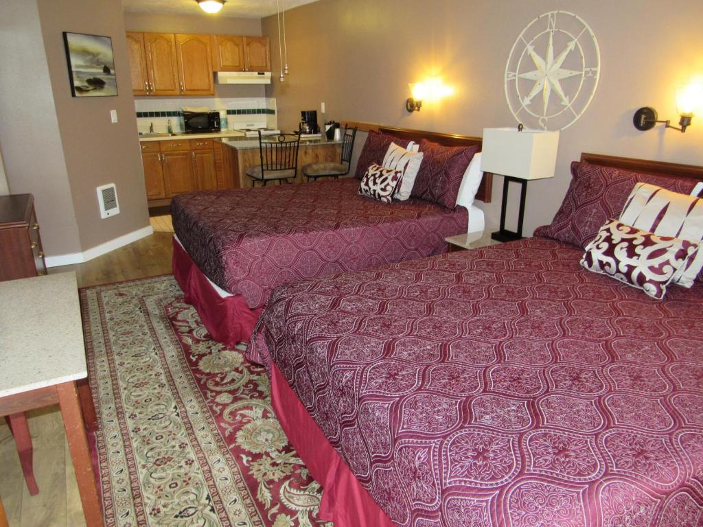 Postel nebo postele na pokoji v ubytování Captain Cook Inn
