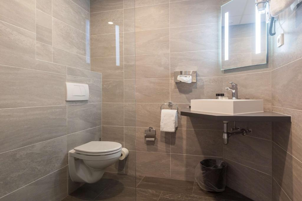 Koupelna v ubytování Best Western Hotel Baars