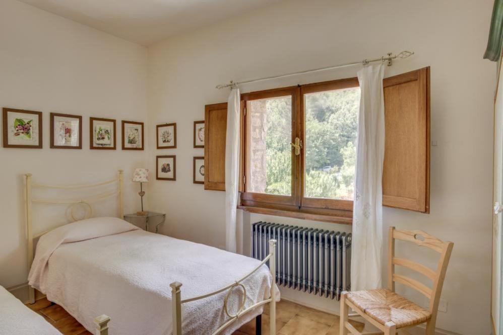 Postel nebo postele na pokoji v ubytování Torre del Falco