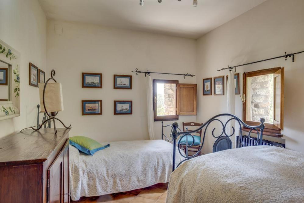 Postel nebo postele na pokoji v ubytování Torre del Falco