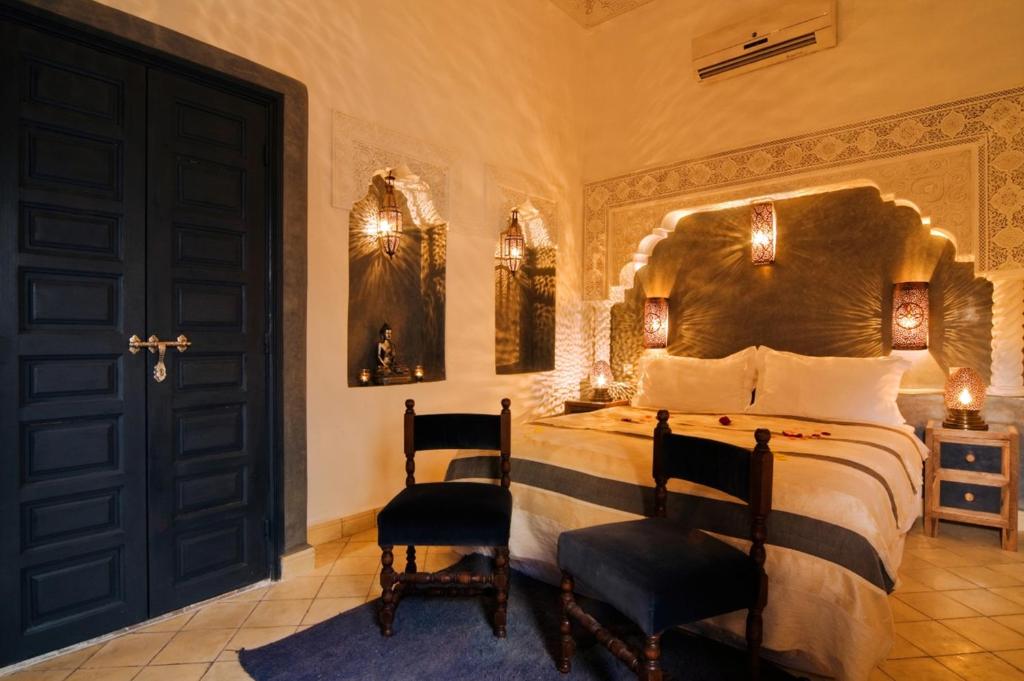 Postel nebo postele na pokoji v ubytování Riad Cinnamon by Marrakech Riad