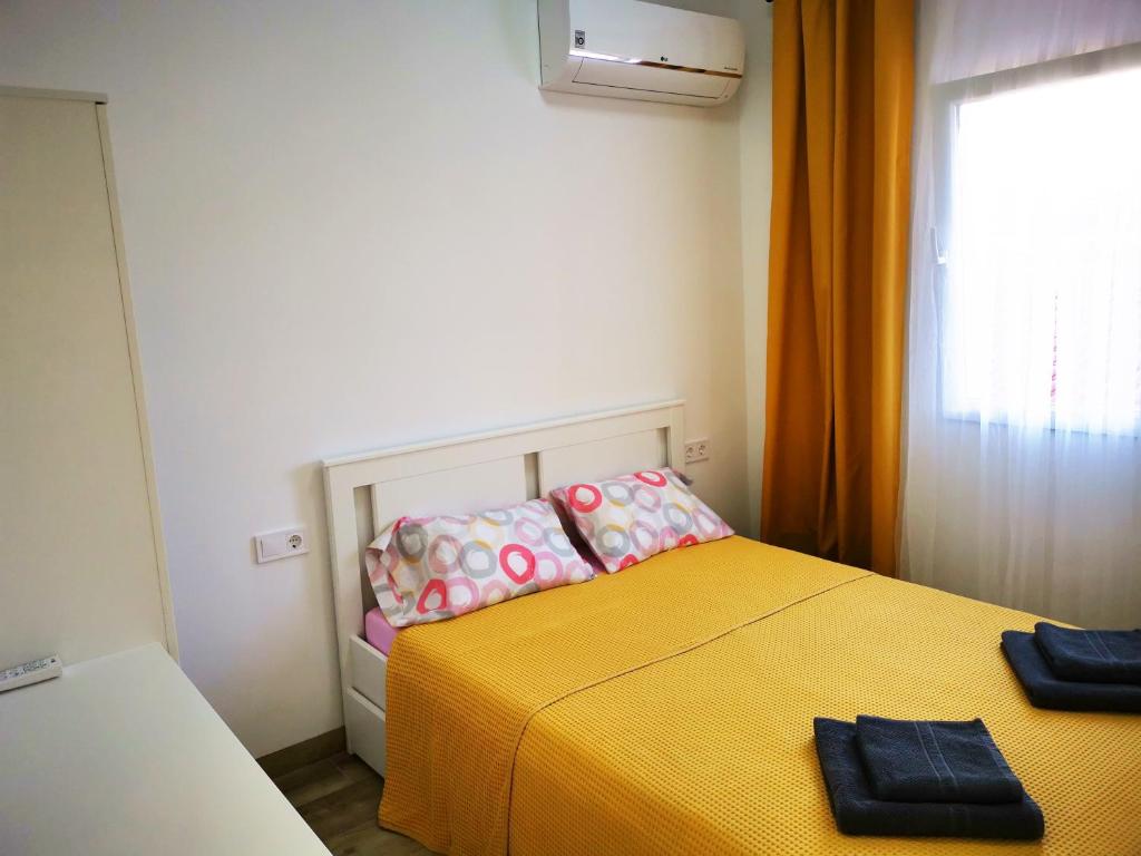 Posteľ alebo postele v izbe v ubytovaní SunnySpainHolidays Apartments