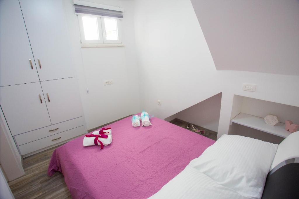 Postel nebo postele na pokoji v ubytování Luxury apartment Lioness