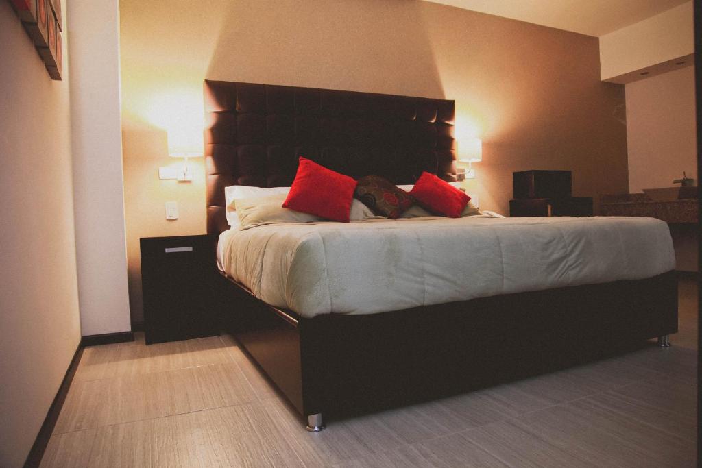 Postel nebo postele na pokoji v ubytování Hotel Rincon del Cielo