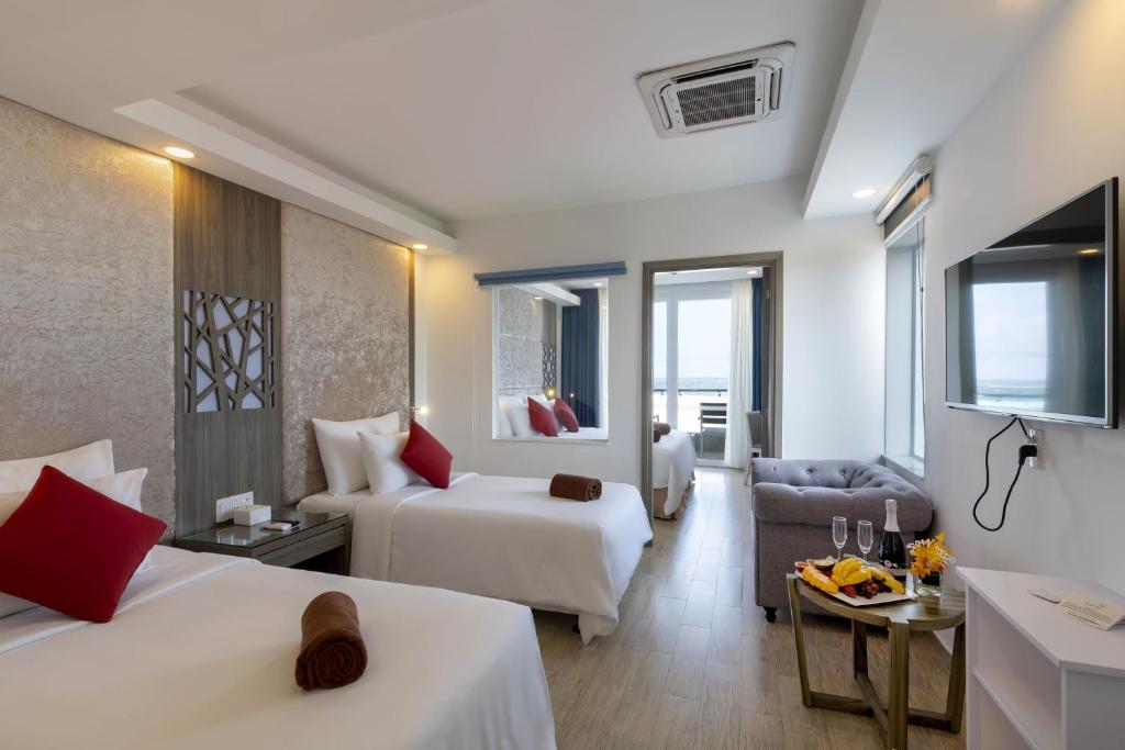 Кровать или кровати в номере Swandor Cam Ranh Resort-Ultra All Inclusive
