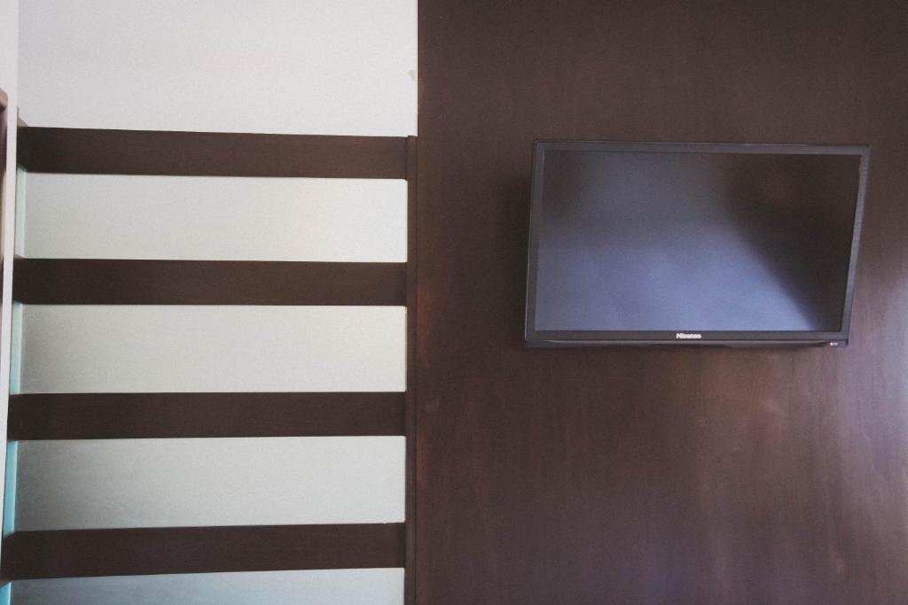TV a/nebo společenská místnost v ubytování Hotel Rincon del Cielo