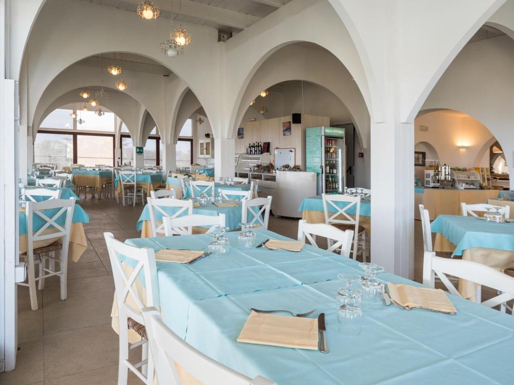 Restaurace v ubytování Hotel Cala Reale