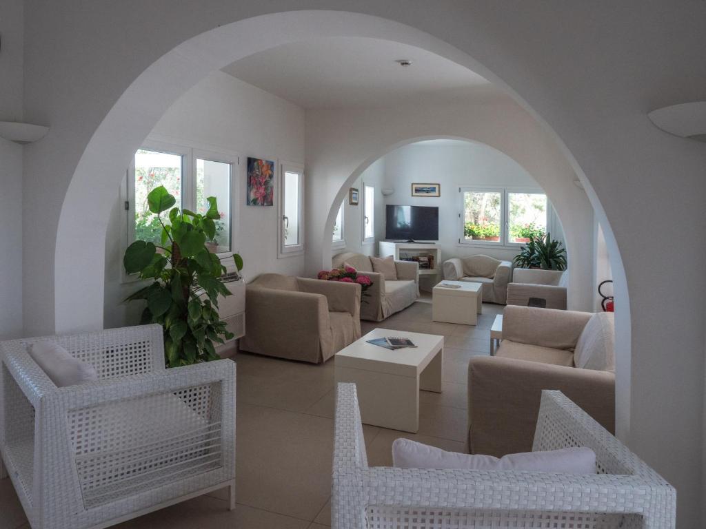 Posezení v ubytování Hotel Cala Reale