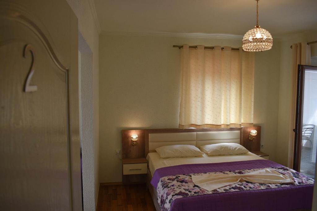 Postel nebo postele na pokoji v ubytování Guest House Alea