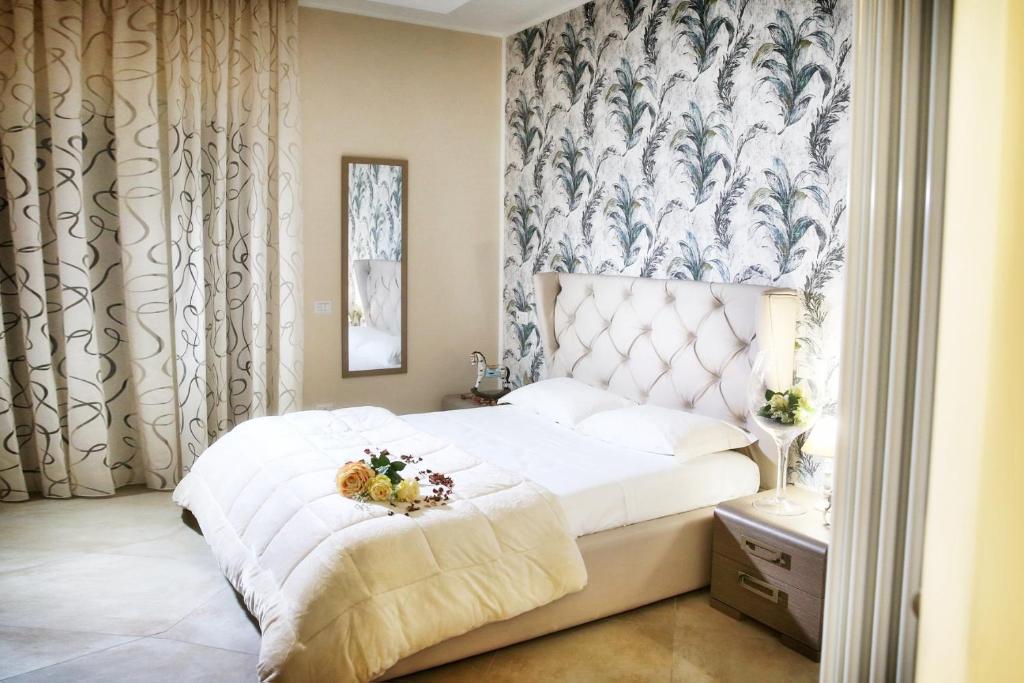 Posteľ alebo postele v izbe v ubytovaní B&B Pompei Olympus
