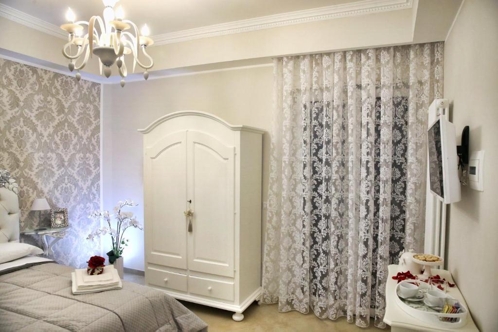 Posteľ alebo postele v izbe v ubytovaní B&B Pompei Olympus