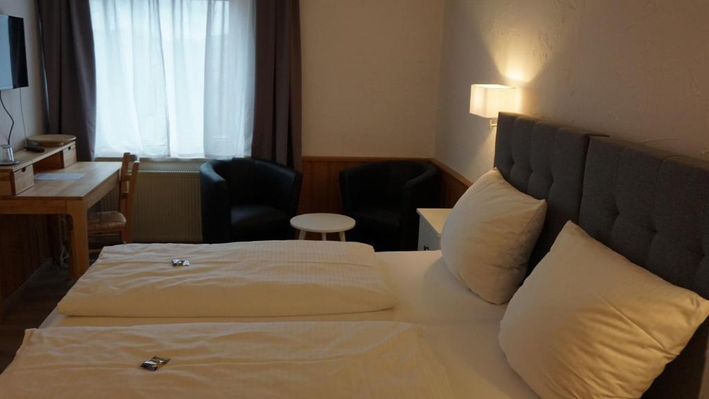 Postel nebo postele na pokoji v ubytování Hotel Sonnenbichl
