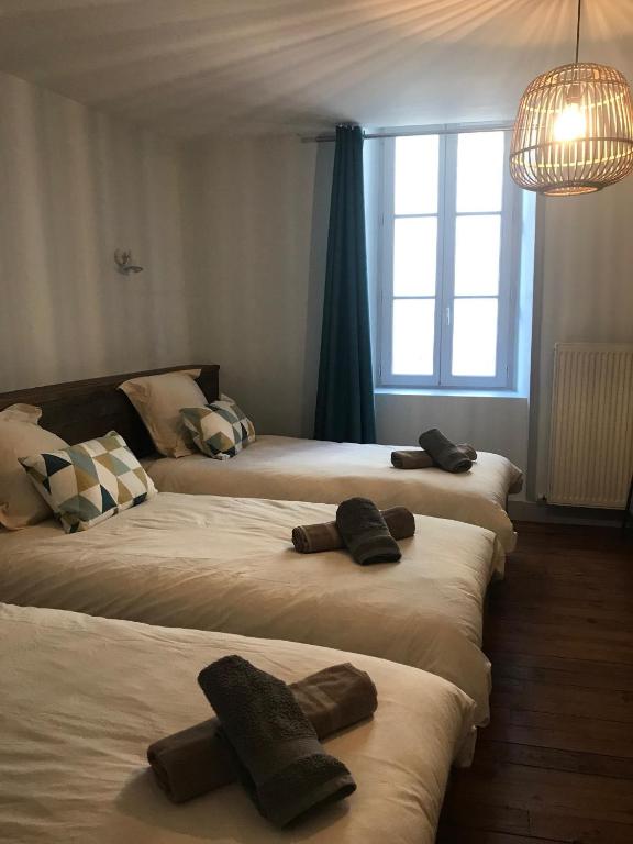 Postel nebo postele na pokoji v ubytování Gîte le pied du géant - Local sécurisé pour les vélos