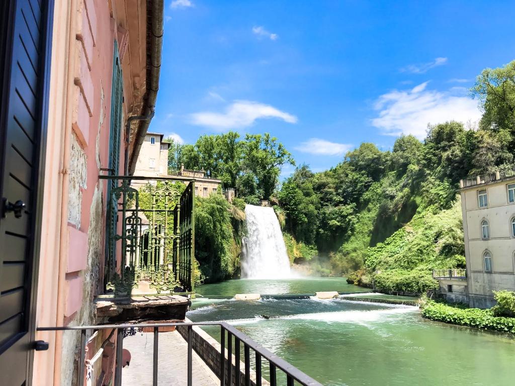 a view of a waterfall from a building at Il balcone di Angelina in Isola del Liri