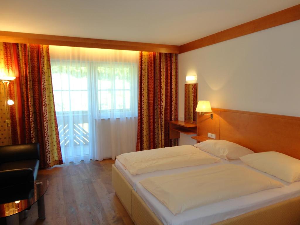 Voodi või voodid majutusasutuse Business-Hotel Stockinger toas