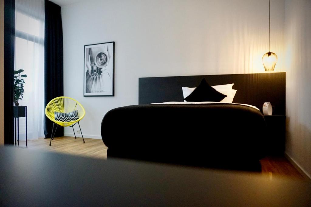 Postel nebo postele na pokoji v ubytování Hotel Merian