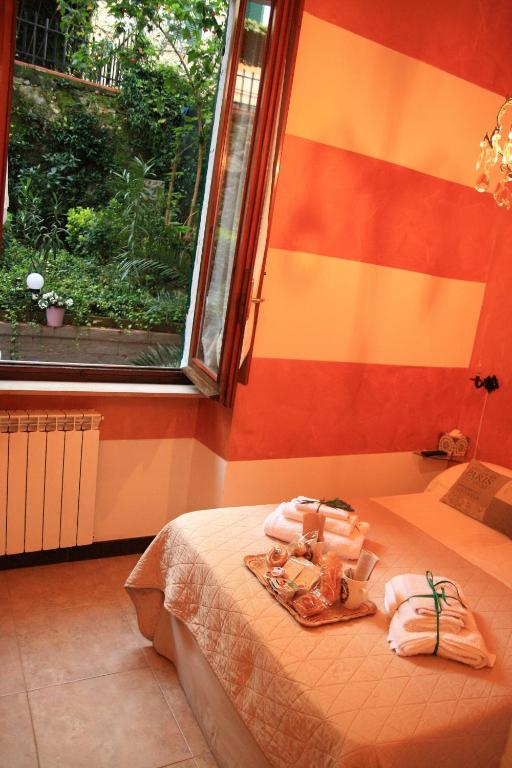Postel nebo postele na pokoji v ubytování Il Giardino di Gianni